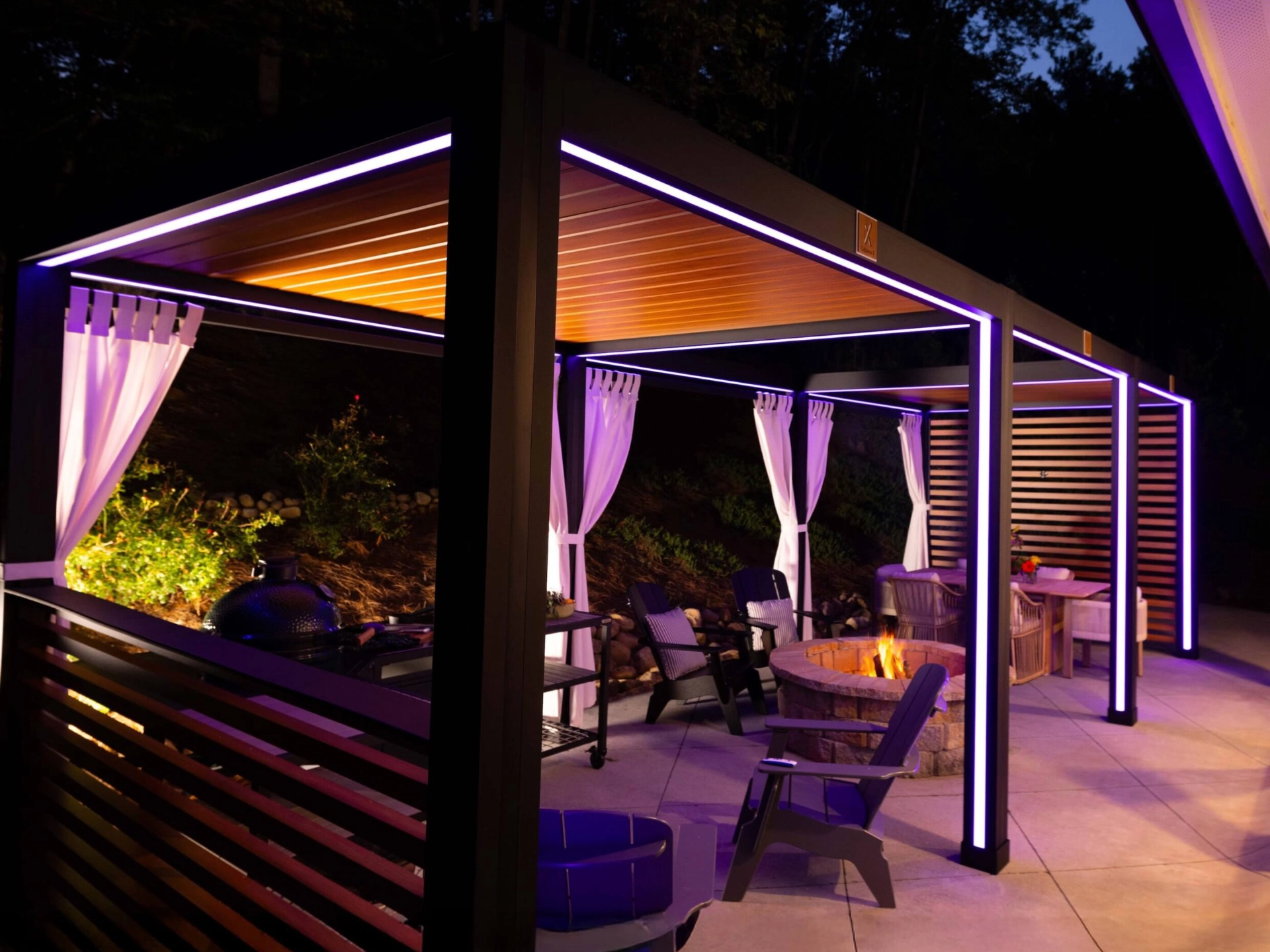 black-cabana-with-lighting-and-outdoor-firepit-and-furnitures-in-needham-ma