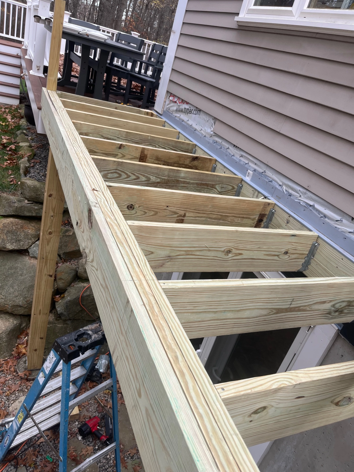 elevated-residential-wooden-deck-framing-in-needham-ma