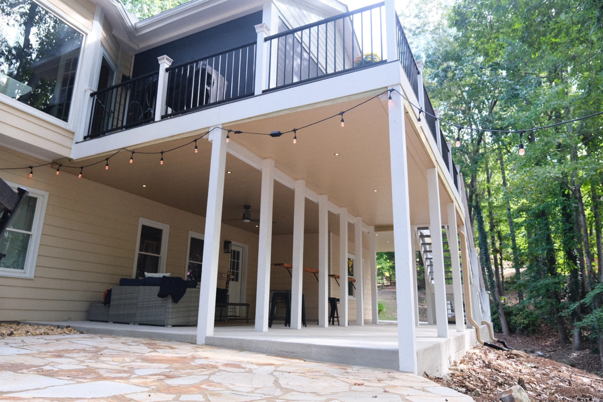 screened-porch-on-the-commercial-underdeck-space-with-gutter-systems-in-needham-ma