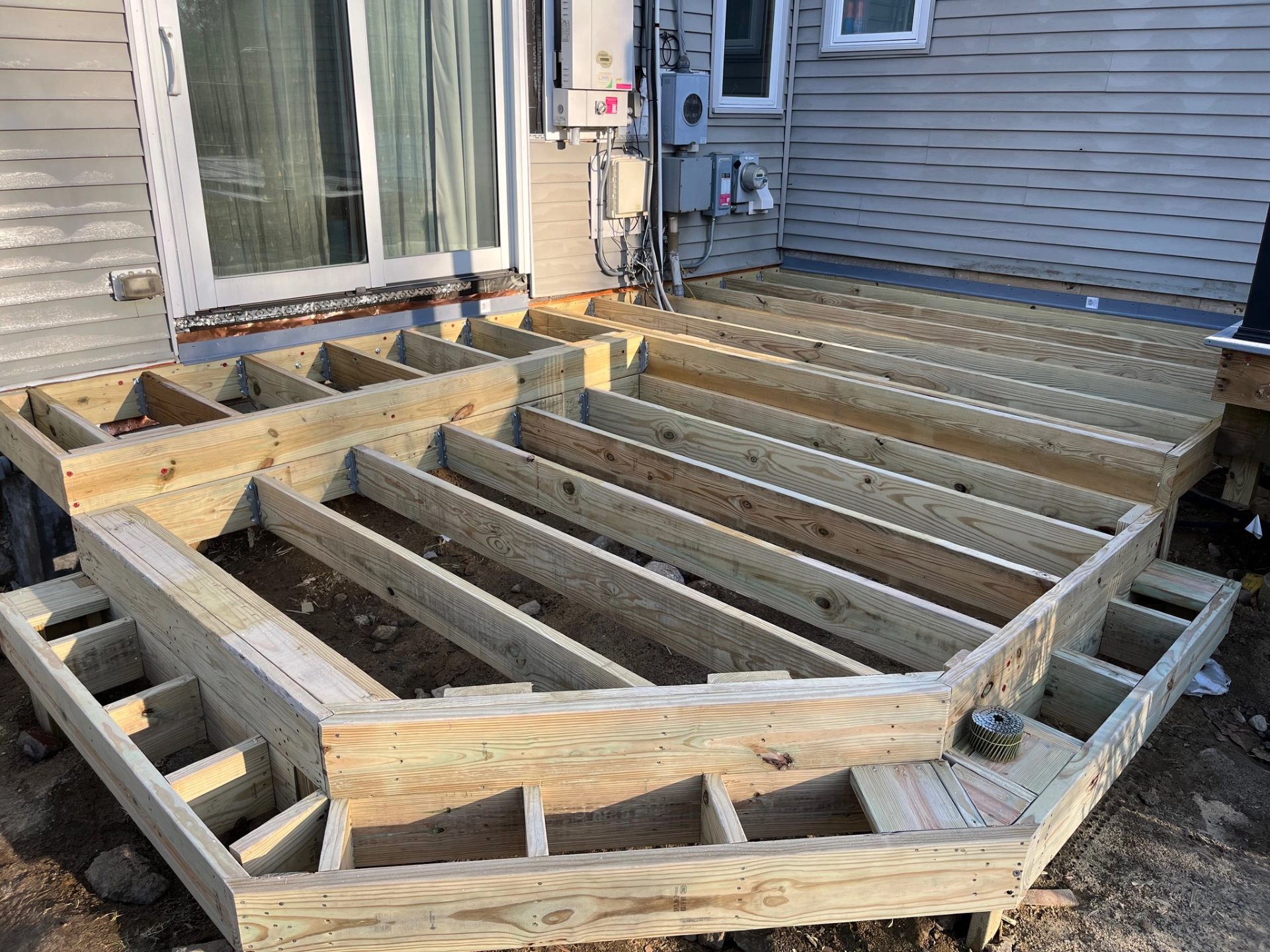 wooden-deck-framing-with-glass-windows-door-in-needham-ma